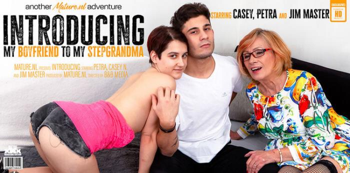 A steamy threesome with a granny and a hot young couple